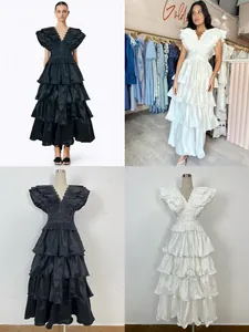 Elegant banquet dress with multi-layered pleated ruffles and tiered skirt design
