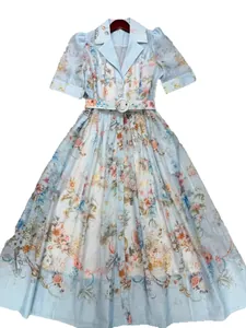 Elegant light blue floral print lapel midi dress featuring short sleeves and matching belt