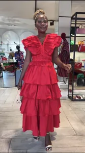 Full view of elegant red tiered ruffled maxi dress with pleated V-neck style details