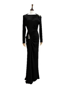 Elegant black long sleeve pleated maxi dress with waist cinching detail