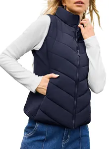 Elegant women's navy blue quilted puffer vest with stand collar and zipper closure