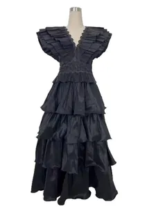 Elegant black tiered ruffled evening gown featuring pleated V-neckline for high-end banquets