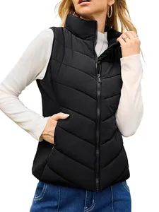 Close-up detail of women's black quilted vest featuring stand collar and zipper