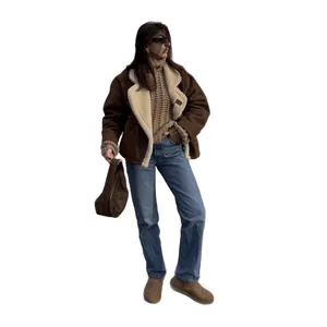 Stylish oversized women's sheepskin jacket with warm cream fleece lining for winter