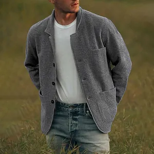 Close-up of a stylish men's grey casual solid color jacket featuring large pockets