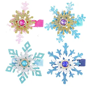 Set of four sparkling Christmas snowflake hair clips decorated with colorful rhinestones