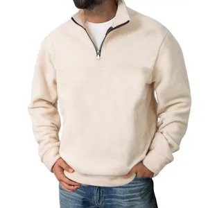 Men's cream half-zip fleece sweatshirt with stand collar and casual fit on model