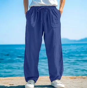 Men's loose drawstring casual beach pants with front pockets in a comfortable blue fabric