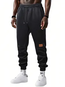 Pantalones de chándal negros ajustados para hombre con forro polar y cordón ajustable