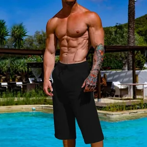 Man wearing black breathable linen cotton sports casual shorts at a summer resort