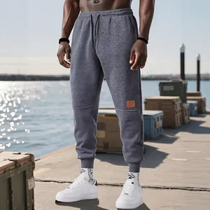 Pantalones deportivos premium de forro polar gris oscuro para hombre con cordón ajustable