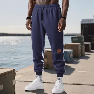 Pantalones de chándal ajustados de forro polar para hombre en azul marino con cordón