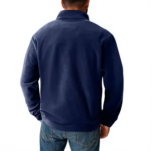 Rear view of men's navy blue fleece half-zip sweatshirt showing fit and texture