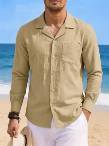 Detail of men's beige cotton linen long sleeve shirt featuring a front pocket and beach style