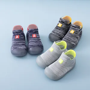 Comfortable non-slip baby walking sock shoes with soft rubber soles in assorted colors