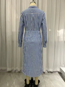 Back view of an elegant blue and white vertical striped shirt dress on a mannequin