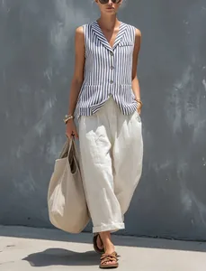French blue striped vest paired with white wide-leg linen pants for summer casual wear