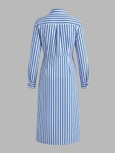 Back view of an elegant blue and white vertical striped long-sleeved shirt midi dress.