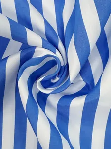 Close-up detail of blue and white striped fabric with a smooth, satin-like texture