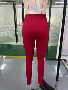 Detailed back view of high waisted red slim fit stretch casual trousers for women