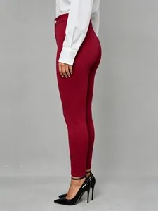 Side view of elegant slim-fit burgundy stretch casual trousers for professional women