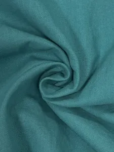 Macro dettagliata della trama del tessuto in misto lino color verde ottanio estivo