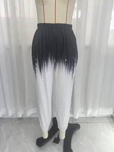 Women's loose knit sweatpants featuring black and white gradient print on a mannequin.