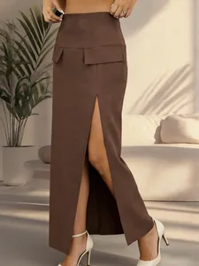 Detailed view of a chic brown high-waisted maxi skirt featuring a high side slit and flap accents