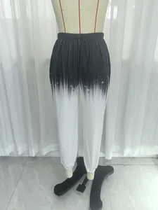 Women's loose casual knit sweatpants featuring a stylish black and white gradient print