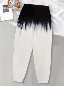 Detail view of women's loose knit joggers featuring a stylish black and white gradient print