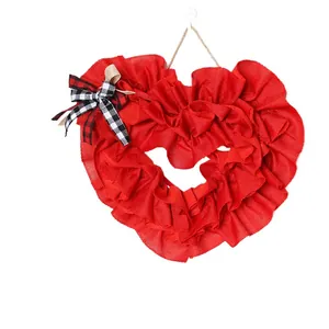Romantic red burlap heart wreath with checkered bow for Valentine's Day wall decor