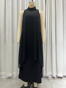 Elegant black sleeveless high-neck dress with mesh stitching detail and layered design