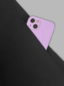Close-up detail of side pocket on elegant black sleeveless dress with purple phone