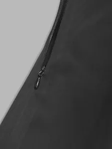 Close-up of concealed zipper and high-quality twill fabric on elegant black dress