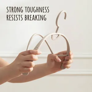 Durable non-slip plastic clothes hanger showing flexible and tough material quality
