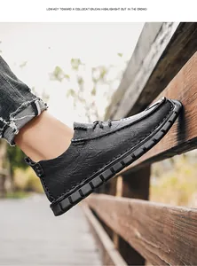 Outdoor side view of black leather casual shoe with non-slip soft sole for men