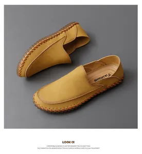 Top-down view of yellow handmade leather loafers for men with rubber soles