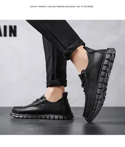 Close-up detail of stylish black men's leather casual loafers featuring non-slip soft soles