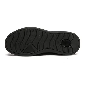 Macro detail of the durable black non-slip rubber outsole for men's casual loafers