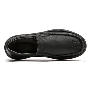 Top view of men's black leather slip-on loafers with soft sole and stitch details