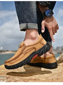 Close-up view of men's outdoor casual leather shoes featuring non-slip rubber soles