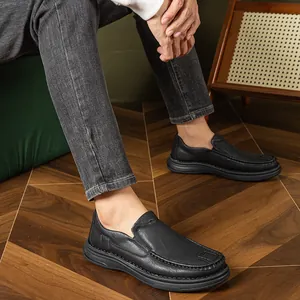 Side view of comfortable black leather loafers for men with durable soft rubber soles