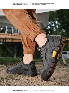 Vue détaillée de profil de chaussures de randonnée gris foncé pour hommes en plein air