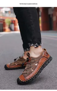 Detailed side view of brown men's outdoor leather sandals on model in street setting