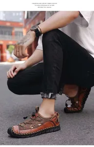 Detailed view of men's brown leather outdoor sports sandals with breathable mesh