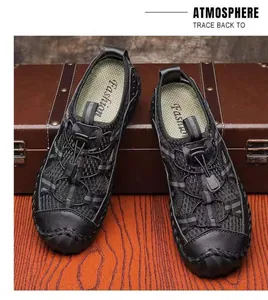 Close-up of black breathable men's outdoor sports sandals with quick-lace system
