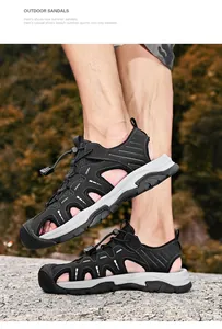 Close-up detail of men's breathable black outdoor sandals with non-slip sole