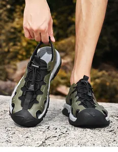 Close-up view of men's olive green closed-toe outdoor breathable hiking sandals