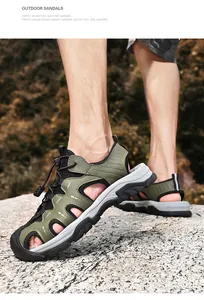 Close-up of durable men's closed-toe outdoor sandals for hiking on rocky mountain terrain