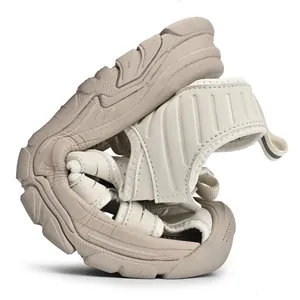 Flexible men's breathable closed-toe sports sandals in beige showing a very soft sole
